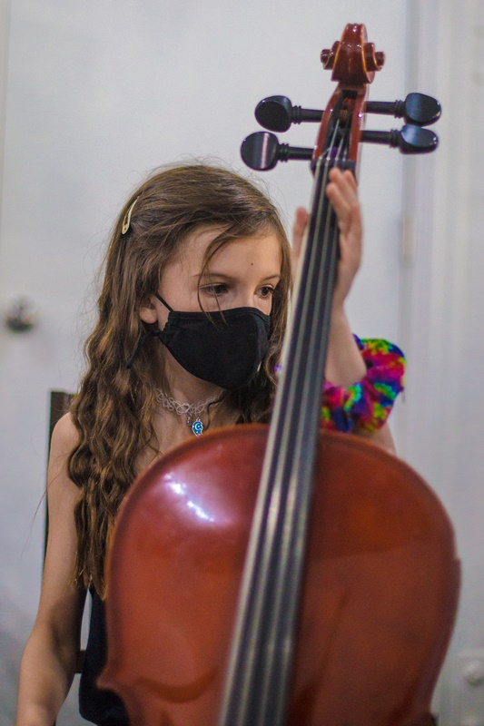 A student playing the cello