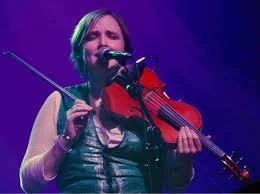 Bex Nicholes, a teacher at Backbeat music Academy,. playing the violin on stage